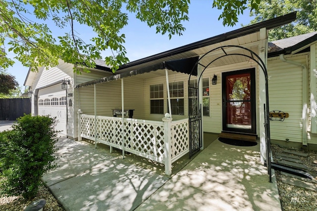 2800 Taylor Ct, Nampa, ID 83686 - doorway to property featuring an attached garage and concrete driveway