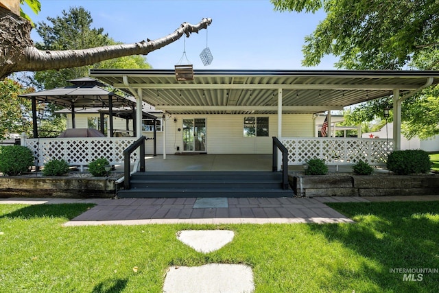 2800 Taylor Ct, Nampa, ID 83686 - rear view of house with a yard and a gazebo