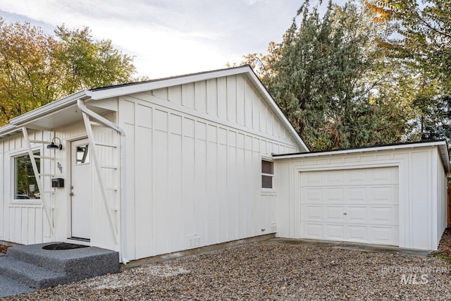 view of property exterior with a garage