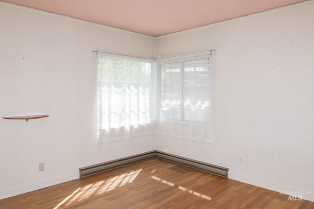 286 SW 3rd Ave, Ontario, OR 97914 - unfurnished room with wood finished floors, baseboards, and ornamental molding