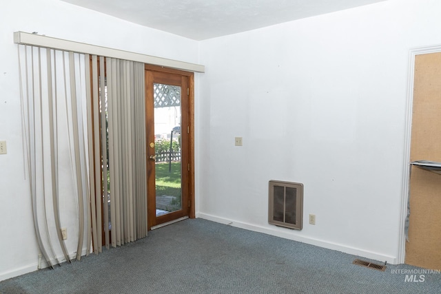 286 SW 3rd Ave, Ontario, OR 97914 - carpeted foyer featuring heating unit and baseboards
