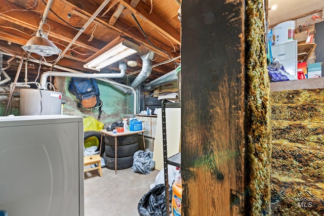 basement with washer / dryer and water heater