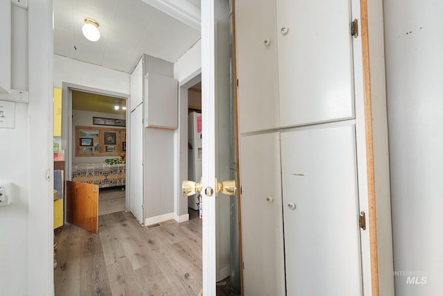 corridor featuring light hardwood / wood-style flooring