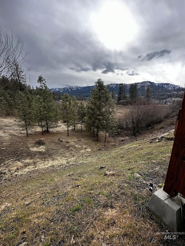 view of mountain feature featuring a rural view