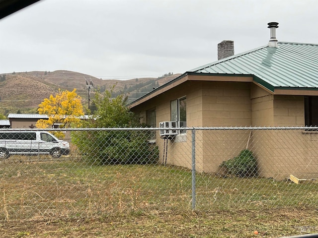 view of side of property featuring a mountain view