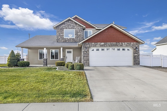 view of front facade featuring a garage and a front lawn