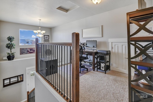 carpeted office with an inviting chandelier and a healthy amount of sunlight