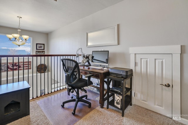 office with carpet floors and a chandelier