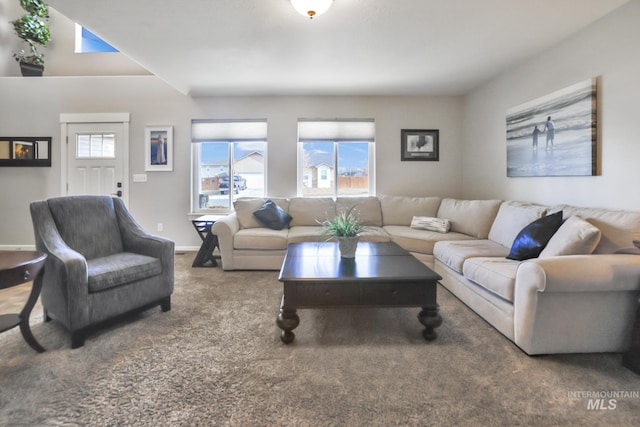 living room with a healthy amount of sunlight and carpet floors