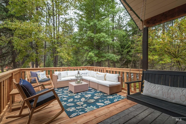 wooden deck featuring an outdoor living space