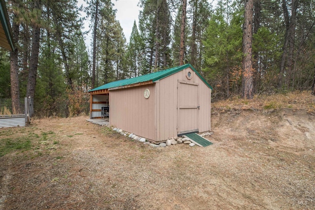 view of outbuilding featuring an outbuilding