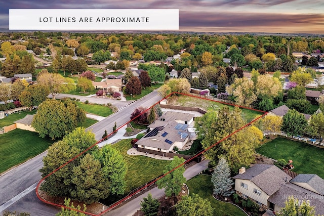aerial view of residential area featuring property parcel outlined