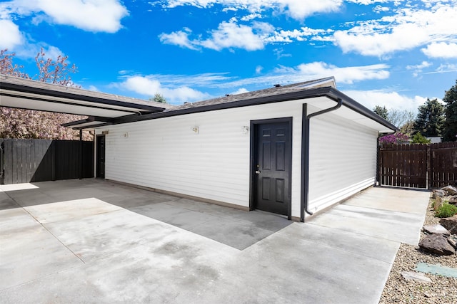 garage with fence