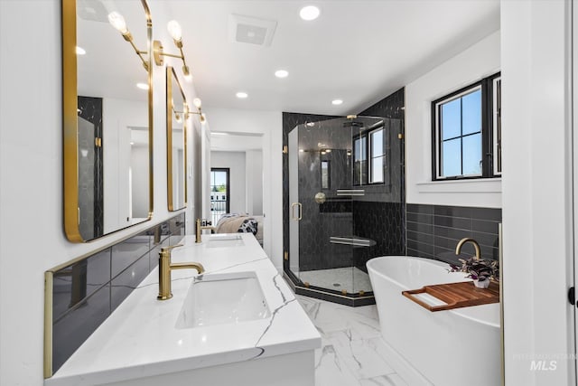 bathroom with double sink, tile floors, tile walls, separate shower and tub, and oversized vanity