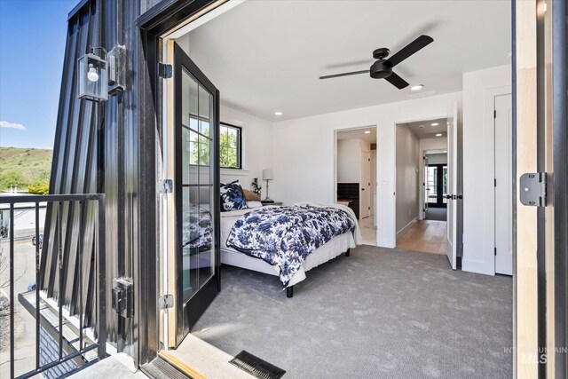 bedroom with carpet and ceiling fan