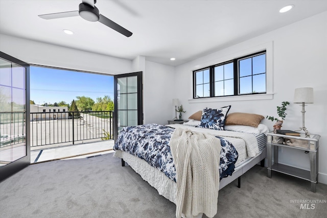 bedroom featuring ceiling fan, access to exterior, and carpet flooring