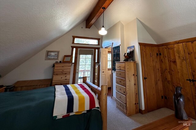 95 Valley Way, Stanley, ID 83278 - bedroom with a textured ceiling, carpet flooring, and access to outside