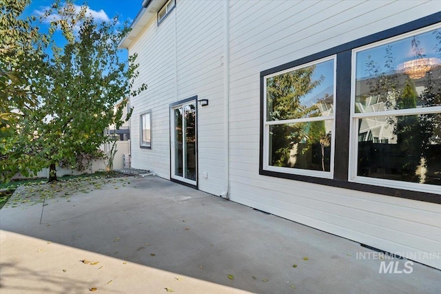 exterior space featuring fence and a patio area