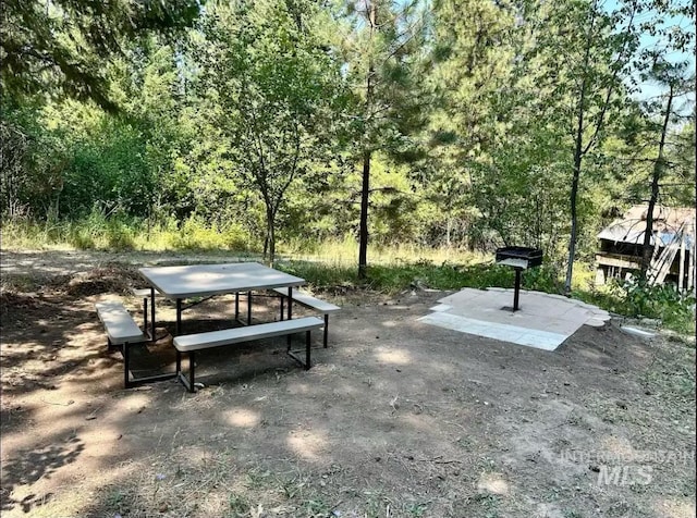 view of home's community featuring a patio area