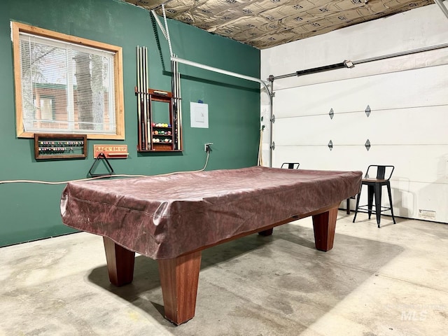 recreation room featuring concrete flooring and billiards