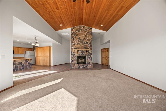 unfurnished living room with carpet, high vaulted ceiling, wooden ceiling, recessed lighting, and baseboards