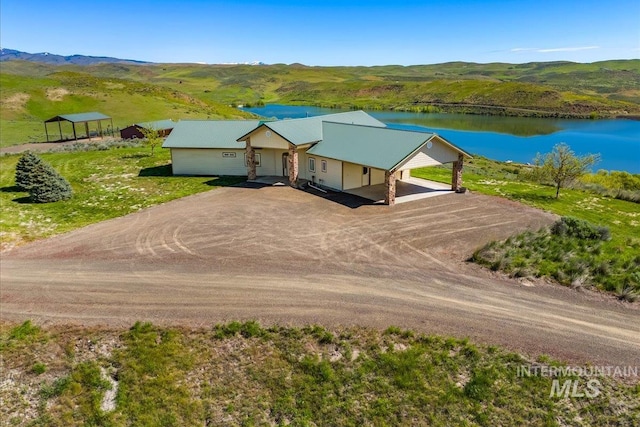 view of subject property featuring a nearby body of water