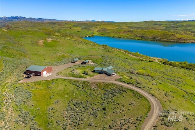 bird's eye view of a water and mountain view