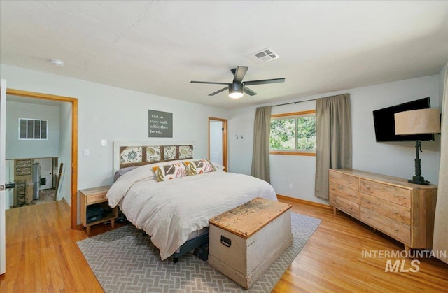 14 Cougar Ln, Boise, ID 83716 - bedroom with light wood-style flooring and ceiling fan