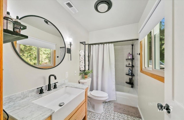 14 Cougar Ln, Boise, ID 83716 - bathroom with plenty of natural light, toilet, vanity, and shower / bath combo
