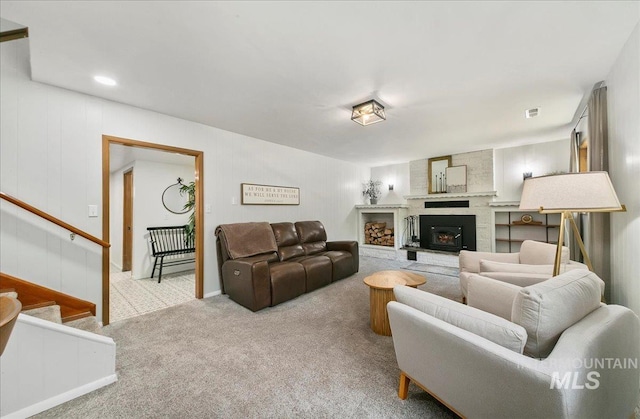 14 Cougar Ln, Boise, ID 83716 - carpeted living room featuring a fireplace and stairs