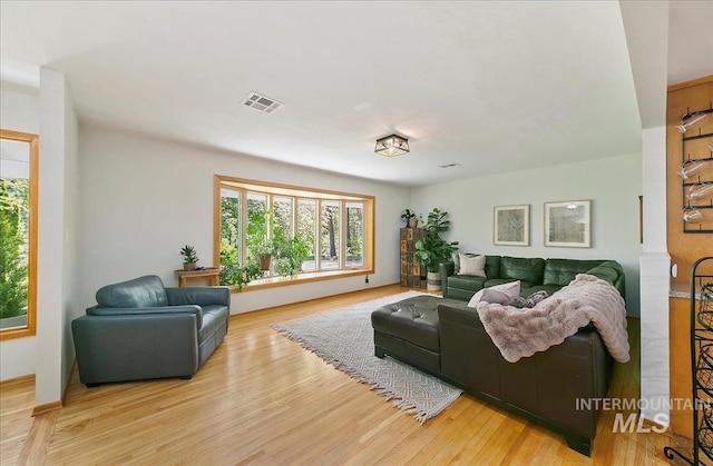 14 Cougar Ln, Boise, ID 83716 - living area featuring healthy amount of natural light and wood finished floors