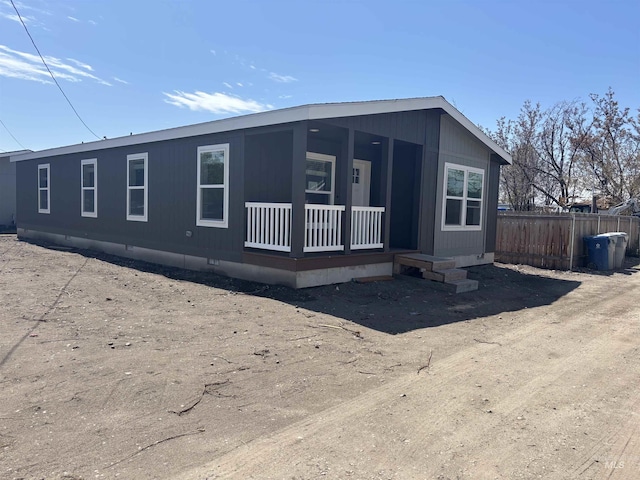 1315 2nd St N, Nampa, ID 83687 - manufactured / mobile home featuring fence, covered porch, and crawl space
