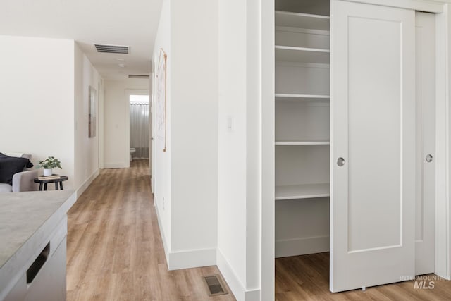 closet featuring visible vents