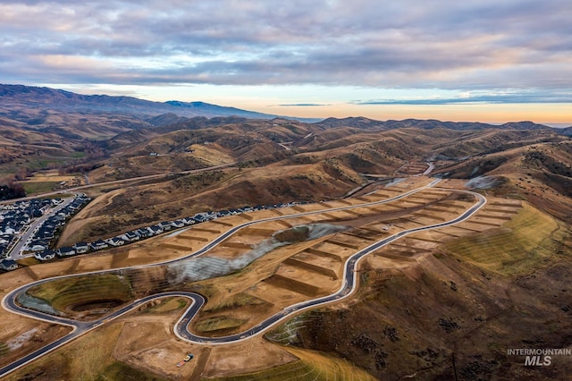 aerial view at dusk with a mountain view