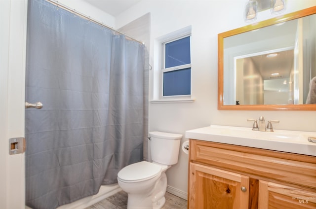 1190 Devils Elbow Rd, Weiser, ID 83672 - full bathroom with vanity, toilet, wood finished floors, and a shower with curtain