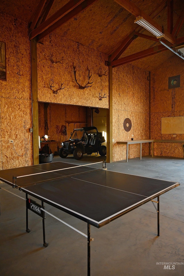 1190 Devils Elbow Rd, Weiser, ID 83672 - recreation room with concrete floors and high vaulted ceiling