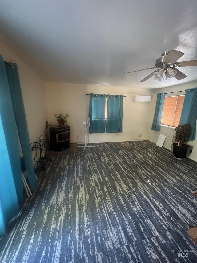 58438 Mansford Ave, Murphy Hot Springs, ID 83302 - empty room with an AC wall unit and a ceiling fan