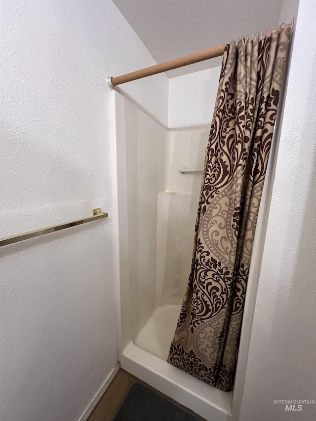 58438 Mansford Ave, Murphy Hot Springs, ID 83302 - full bathroom featuring a stall shower