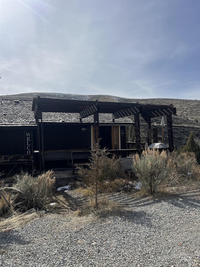 58438 Mansford Ave, Murphy Hot Springs, ID 83302 - back of house featuring a pergola