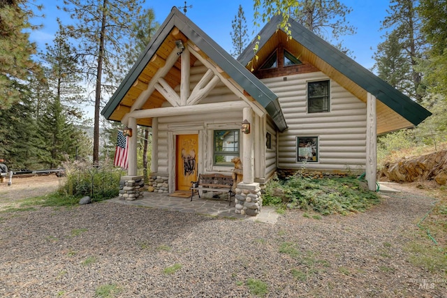 view of log cabin