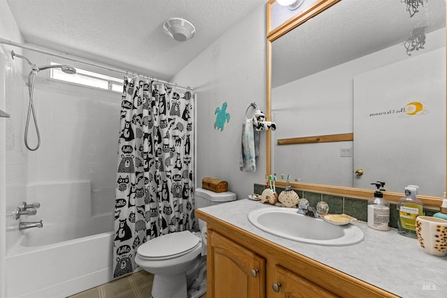 full bathroom featuring shower / bath combo, toilet, vanity with extensive cabinet space, a textured ceiling, and tile floors