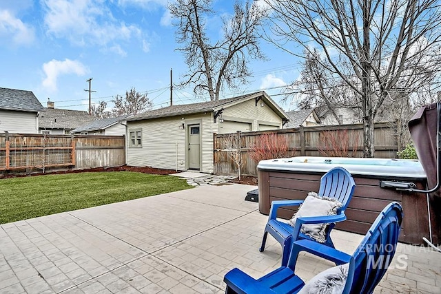 view of patio featuring a fenced backyard and a hot tub