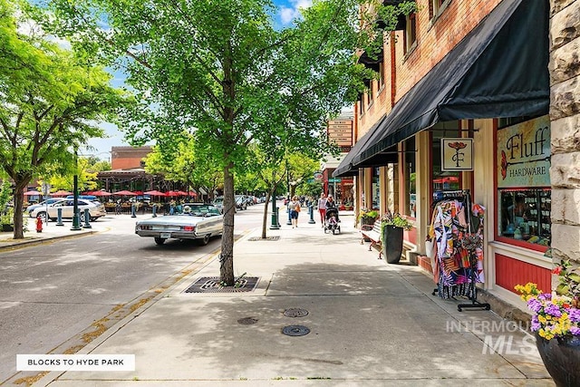 exterior space featuring sidewalks and curbs