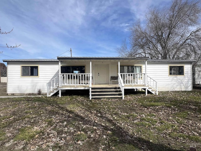 view of front of house with covered porch