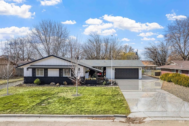 ranch-style home featuring driveway, brick siding, a garage, and a front yard