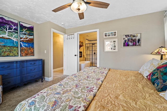 carpeted bedroom featuring ceiling fan, baseboards, and a textured ceiling