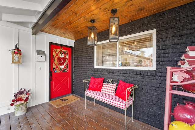 entrance to property featuring a porch