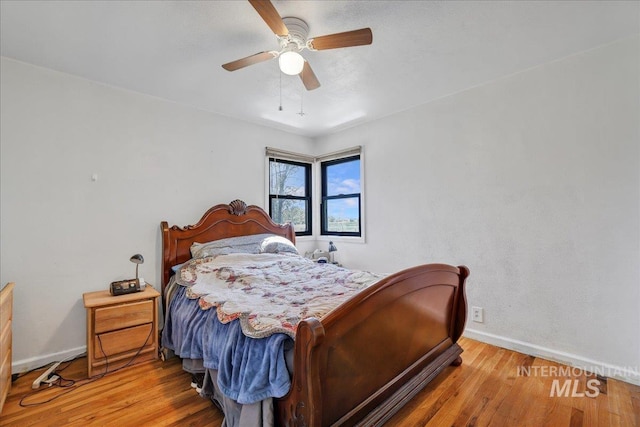 805 Utah, Gooding, ID 83330 - bedroom with baseboards, wood finished floors, and ceiling fan