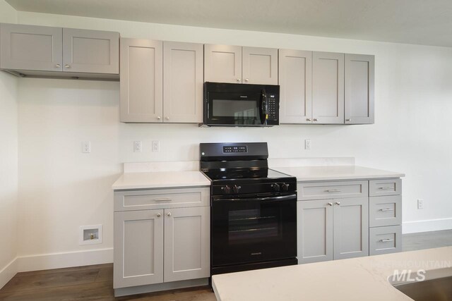 1410 Regency Way, Emmett, ID 83617 - kitchen featuring black appliances, baseboards, and light countertops