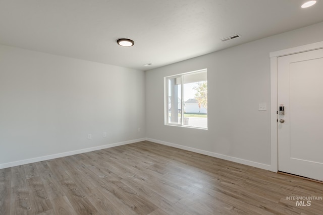 empty room featuring light hardwood / wood-style floors